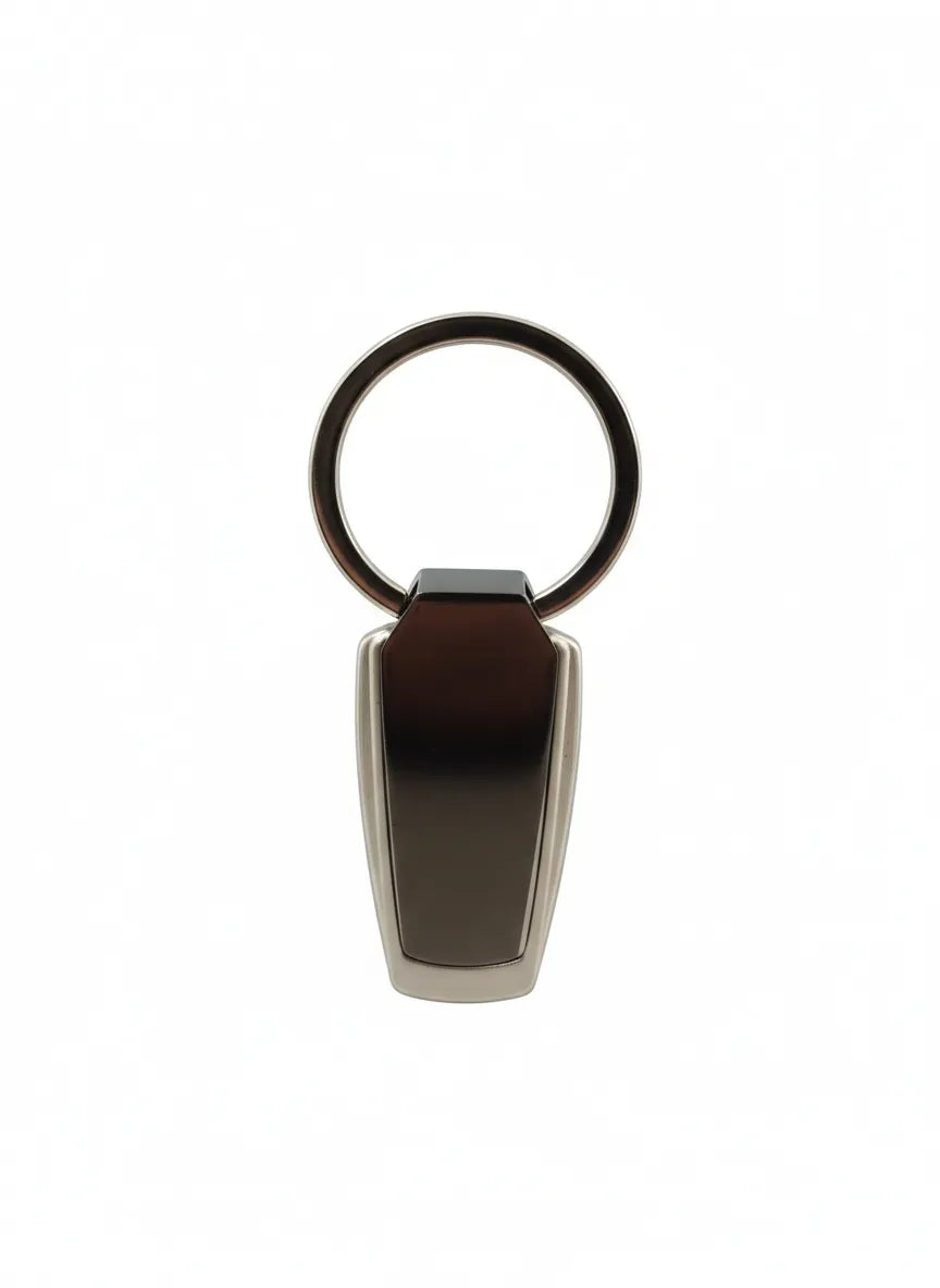Metal keychain with gradient design on a white background